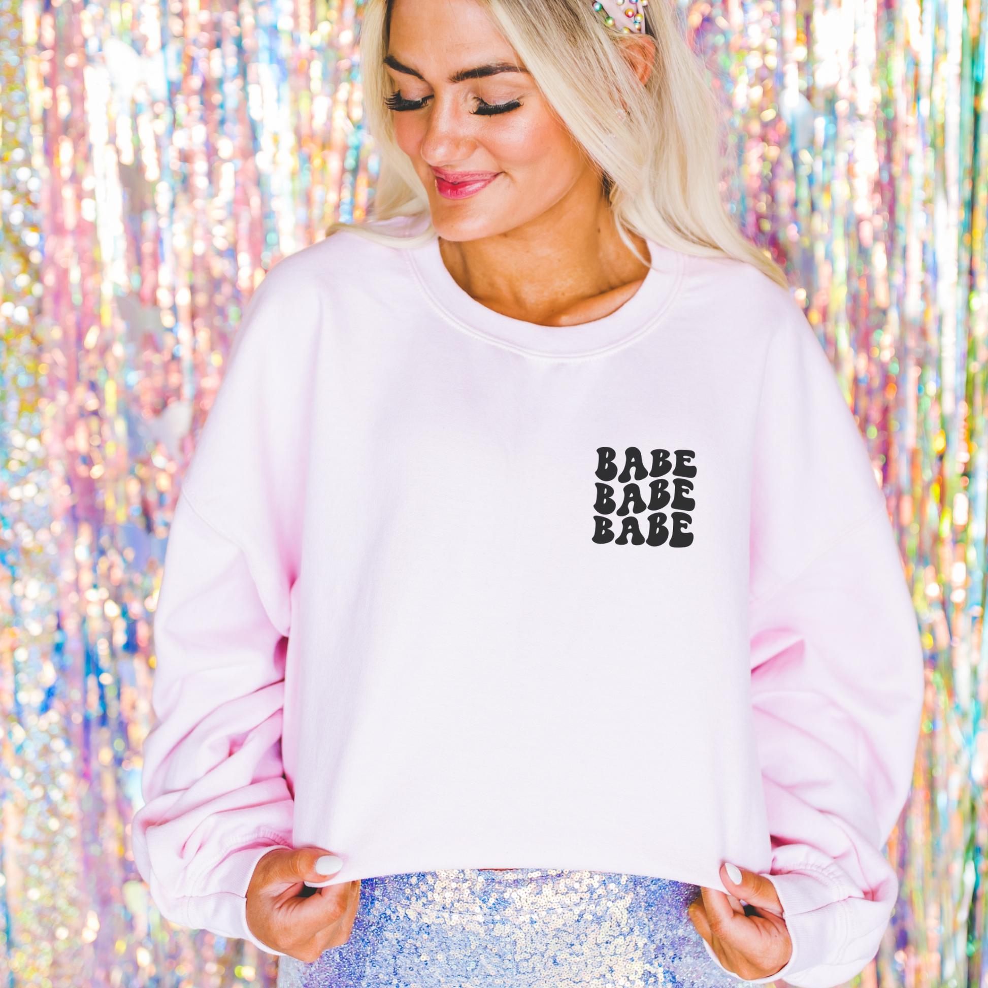 Custom bachelorette party sweatshirts with words on back and custom front design.